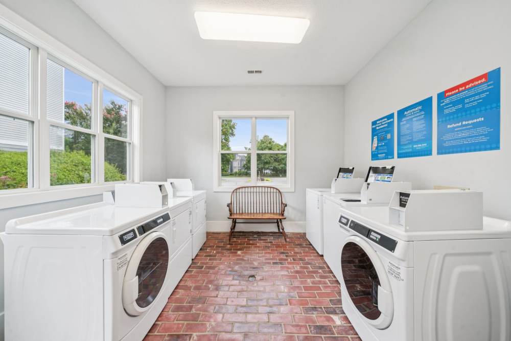 Laundry facility with washer and dryer at Pilot House in Newport News, Virginia