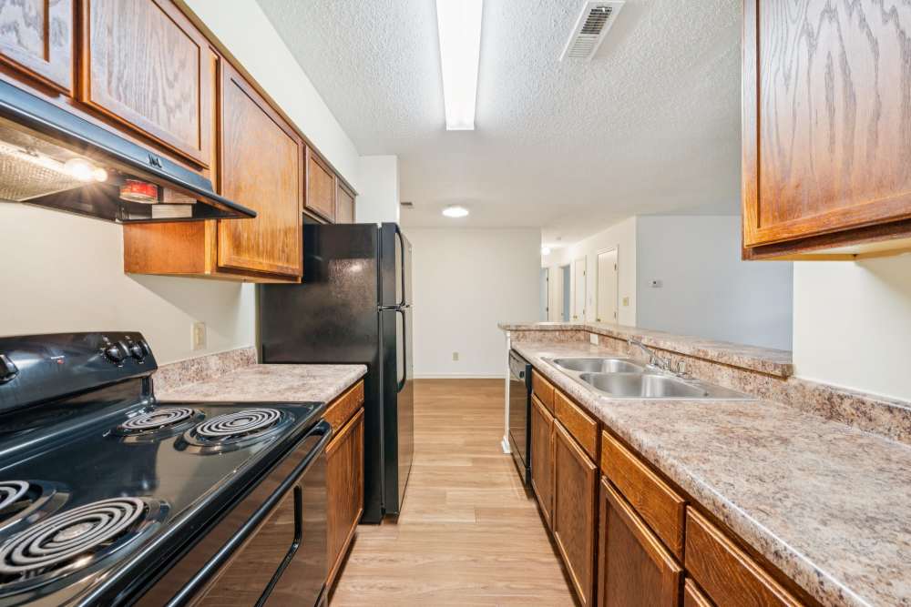 Kitchen with black appliance at Pilot House in Newport News, Virginia