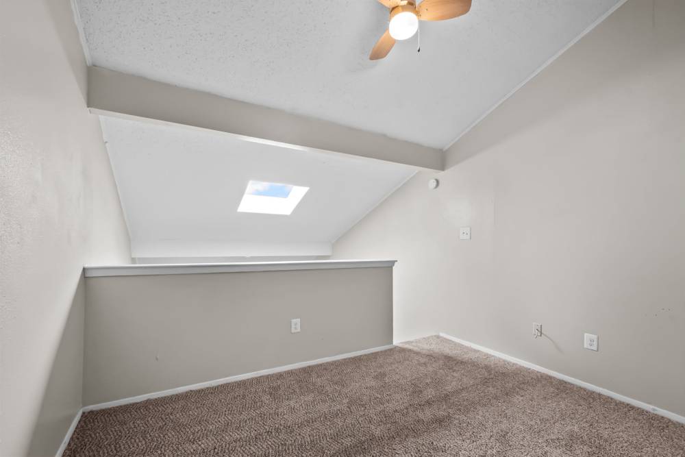 View of the living room at Parkwood Square in Arlington, Texas