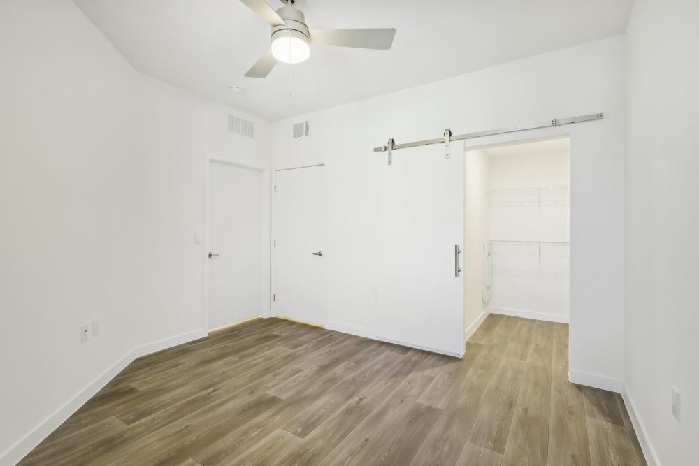 Spacious bedroom with ceiling fan at Tempo in Las Vegas Nevada
