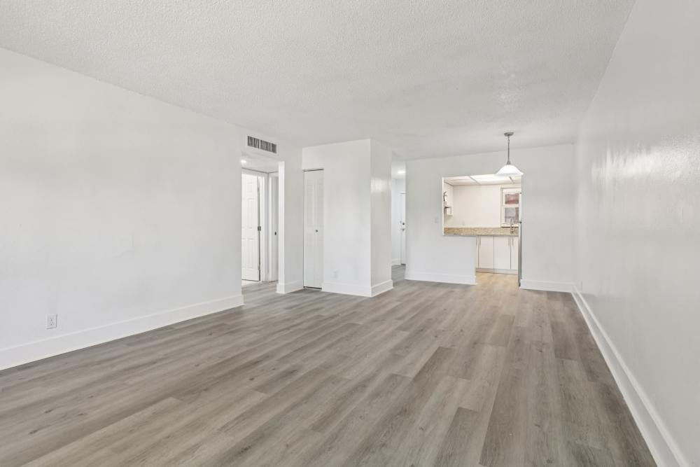 Spacious apartment with hard wood flooring at El Jardin Apartments in Hollywood, Florida