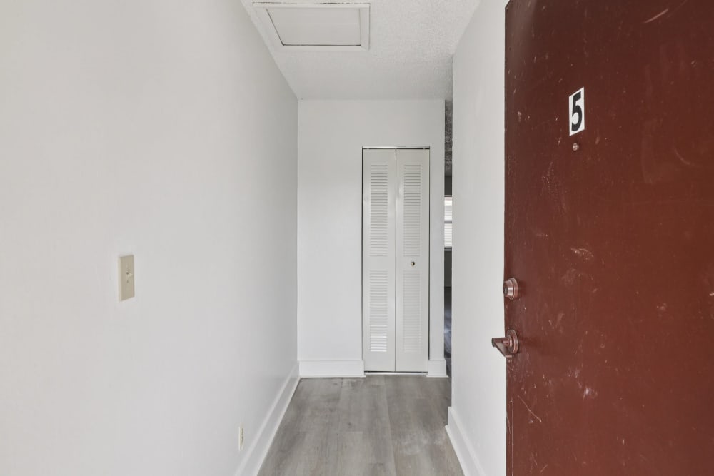 Entrance hallway of an apartment at El Jardin Apartments in Hollywood, Florida