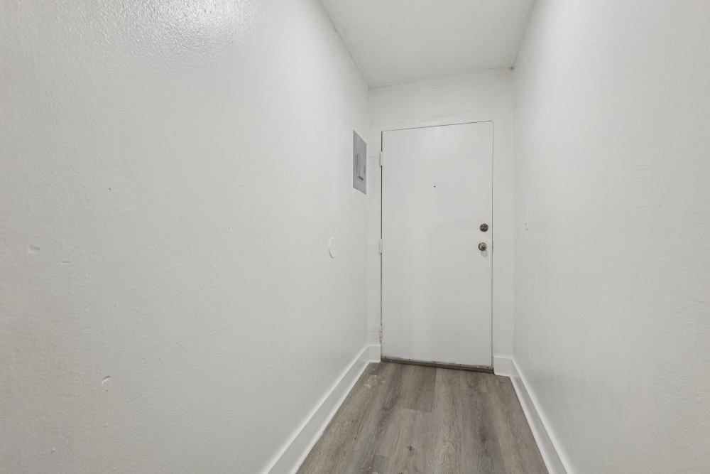 Hallway of an apartment at El Jardin Apartments in Hollywood, Florida