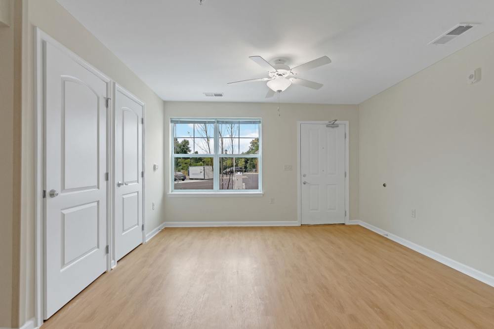 Living room with ceiling fan at Robinson Overlook in Columbia, Maryland
