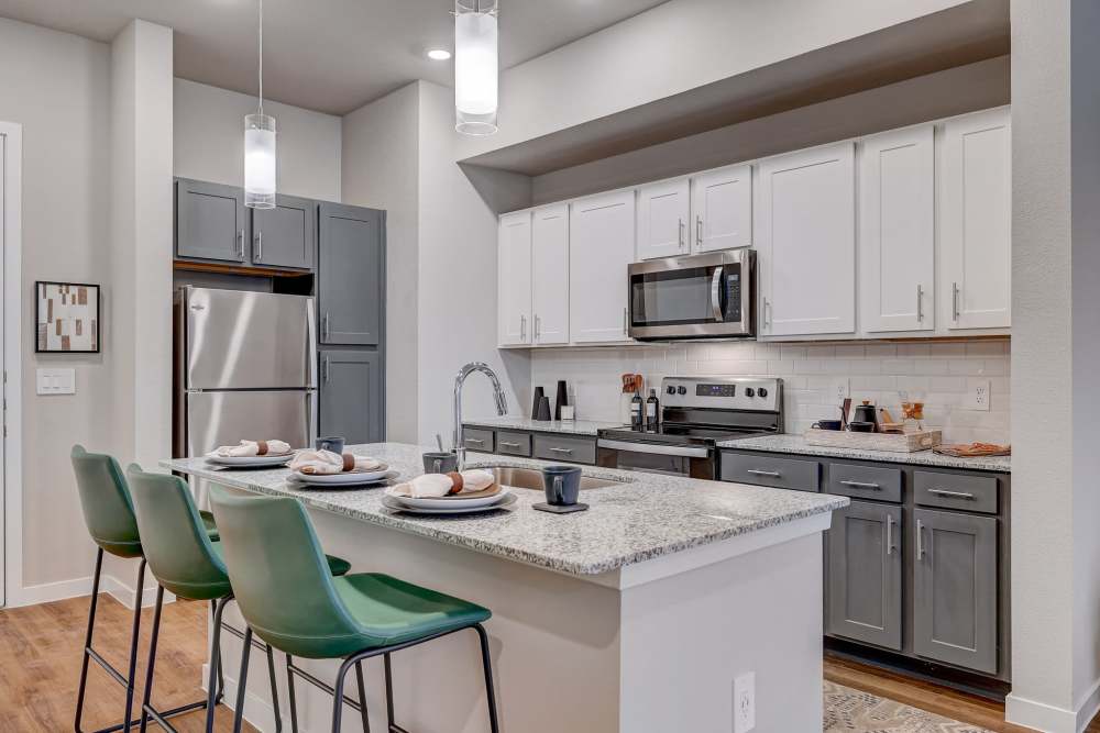 Kitchen with island at The Springs at Georgetown in Georgetown, Texas