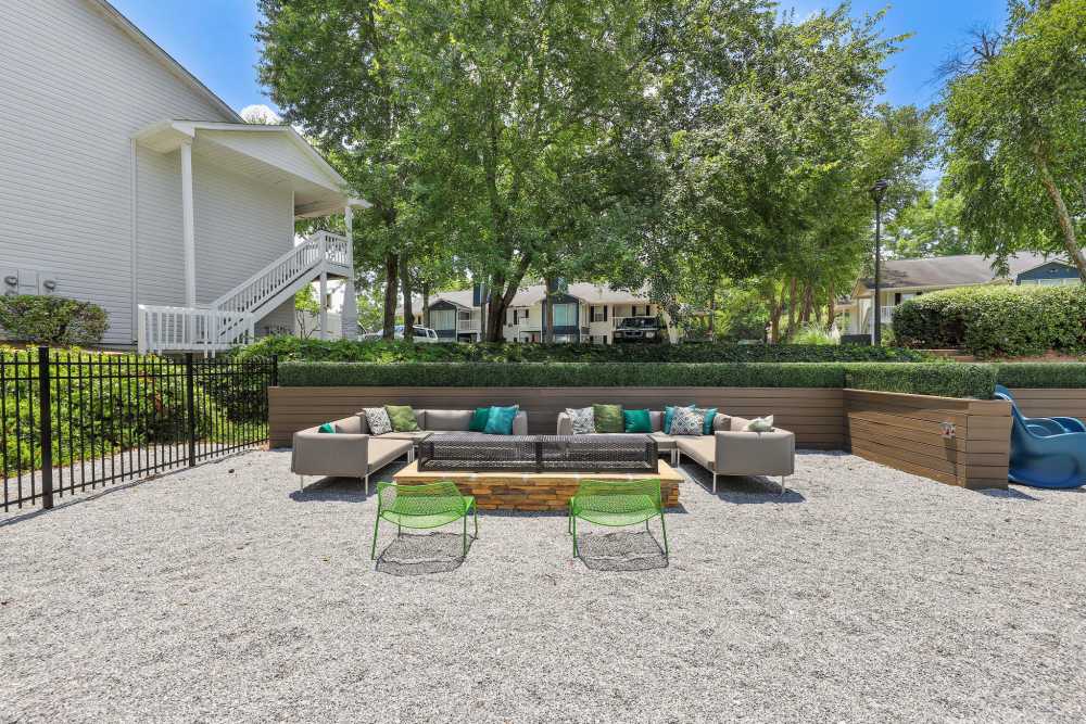 Outdoor seating area with fireplace at Preserve at Dunwoody in Dunwoody, Georgia
