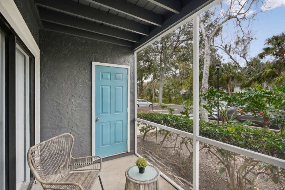 Screened patio with blue door at Lake Forest in Daytona Beach, Florida