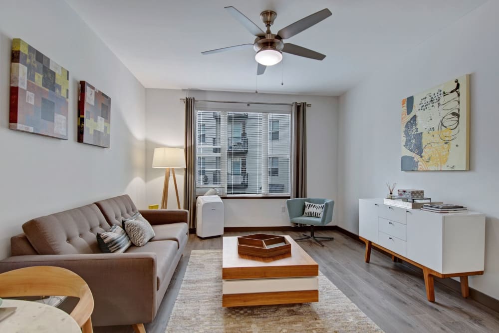 Wood-style flooring in an apartment living room at Tessera at Orenco Station in Hillsboro, Oregon