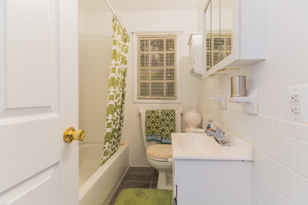 Apartment bathroom at Village Square Apartments in Mount Holly, New Jersey