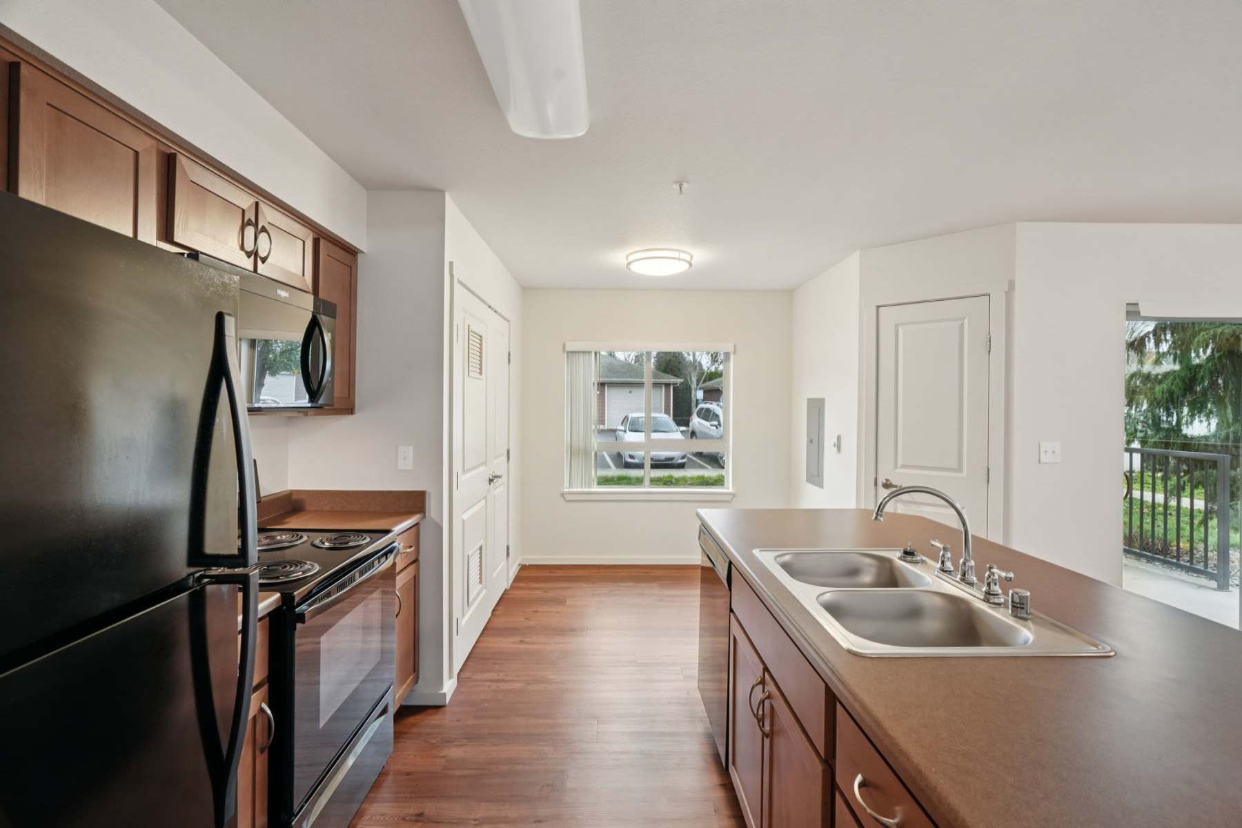 Kitchen with appliances at Copper Lane in Vancouver, Washington