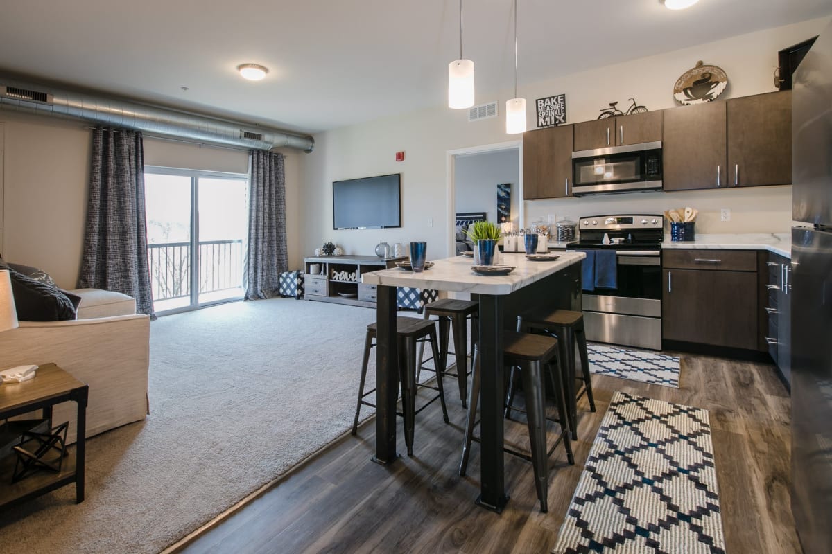 Living room and kitchen at Park West 205 Apartment Homes in Pittsburgh, Pennsylvania