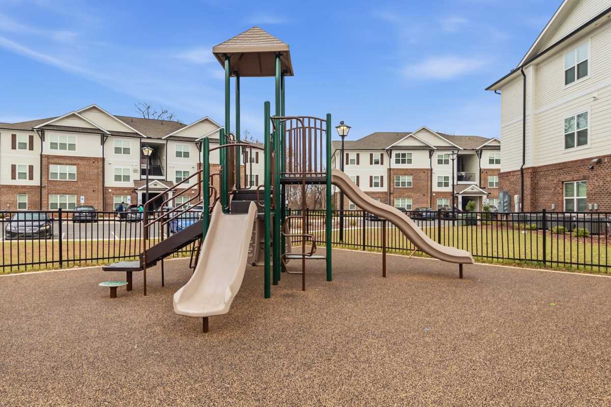 Community playground with slides at Buffalo Terrace in Concord, North Carolina