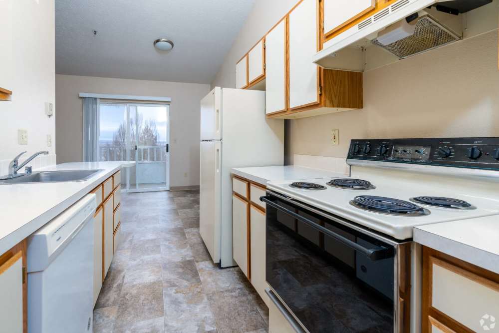Kitchen with dishwasher at Stonecrest Apartments in Spokane, Washington