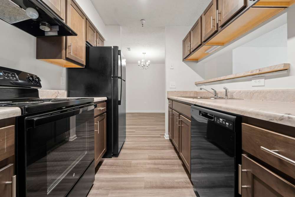 Fully equipped kitchen with appliances at Dulles Center Apartments in Herndon, Virginia