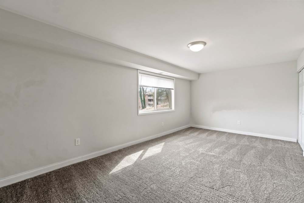 Well-lit and spacious bedroom at Chesapeake Landing Apartments in Landover Hills, Maryland