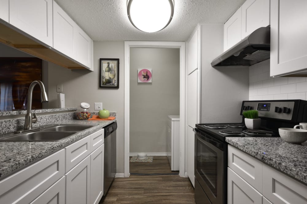 An apartment kitchen at The Fredd Townhomes in San Antonio, Texas at The Fredd Townhomes in San Antonio, Texas