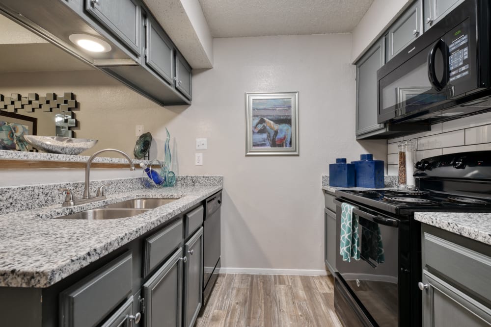 An apartment kitchen at Villas de Santa Fe in San Antonio, Texas