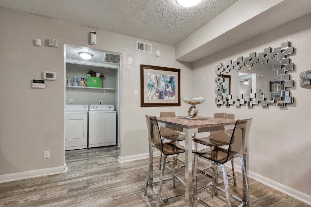 An apartment with a washer and dryer at Villas de Santa Fe in San Antonio, Texas