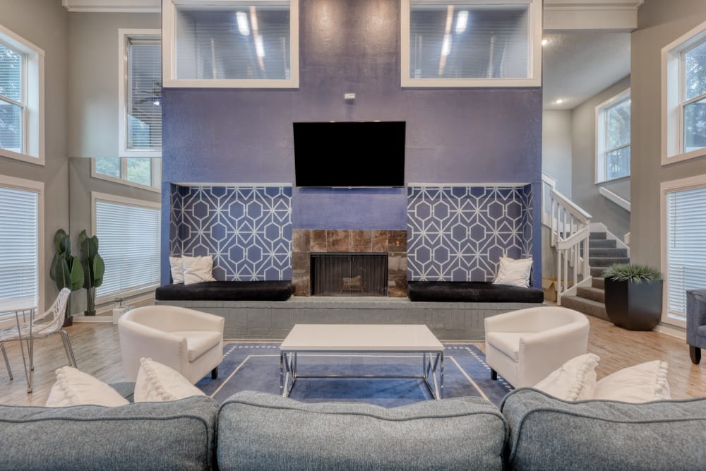 Seating around the fireplace in the clubhouse at Villas de Santa Fe in San Antonio, Texas