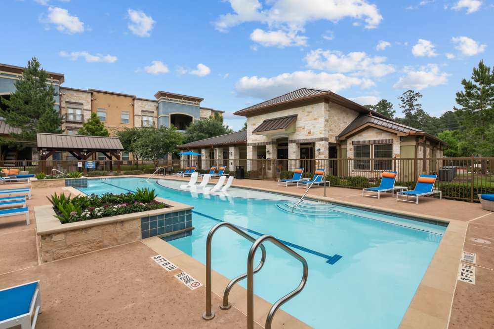 Swimming pool with community view at The Loop in Conroe, Texas