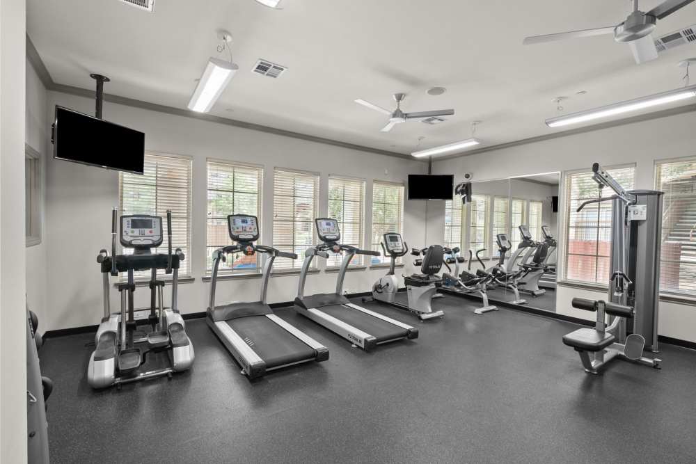 Fitness center with treadmills at The Loop in Conroe, Texas