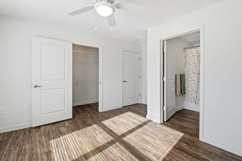 Unfurnished bedroom with wooden flooring at Butler Park in Andrews, Texas