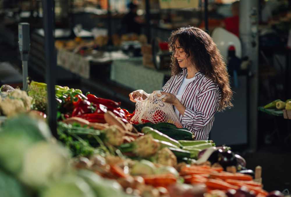 Woman shopping vegetables near RIVA Solana Beach in Solana Beach,California