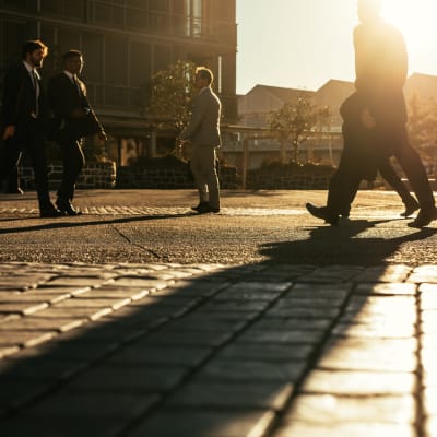 People walking near The Fitz Apartments in Dallas, Texas