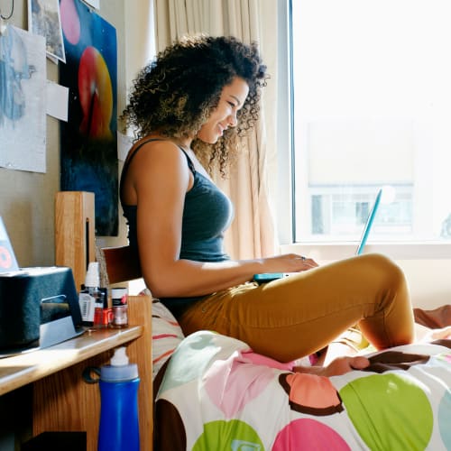 Student studying in her room at Rise Manoa in Honolulu, Hawaii