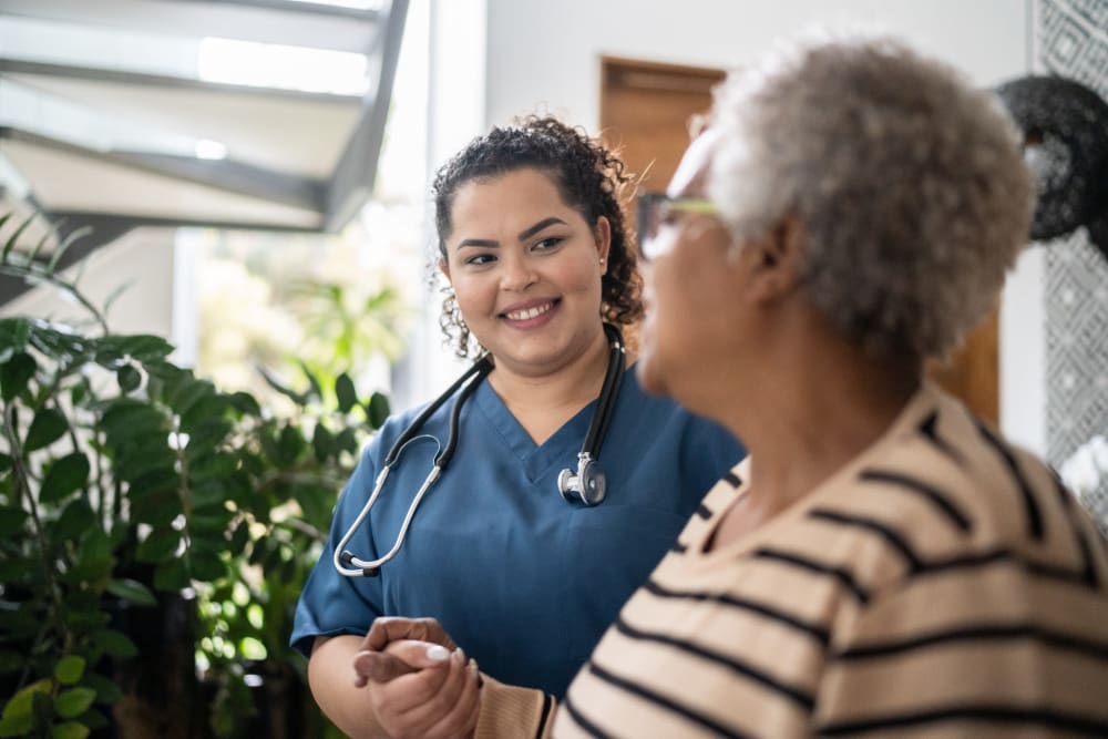 Staff member with resident at Ponté Palmero in Cameron Park, California