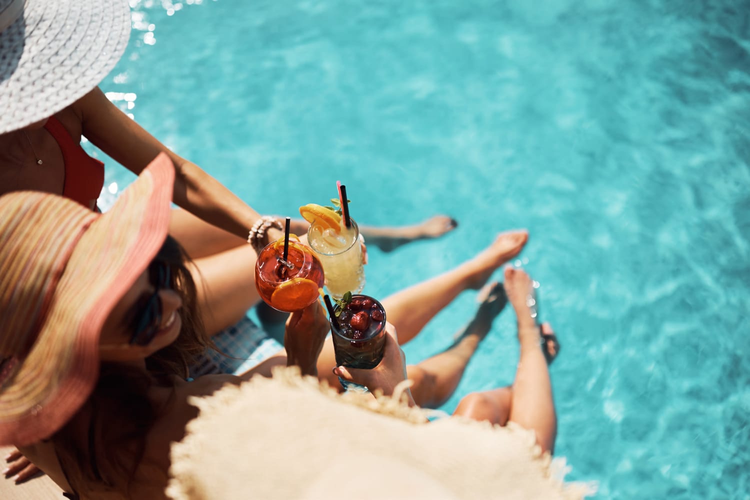 Drinking cocktails by the pool at Station 21 Apartments in Mesa, Arizona