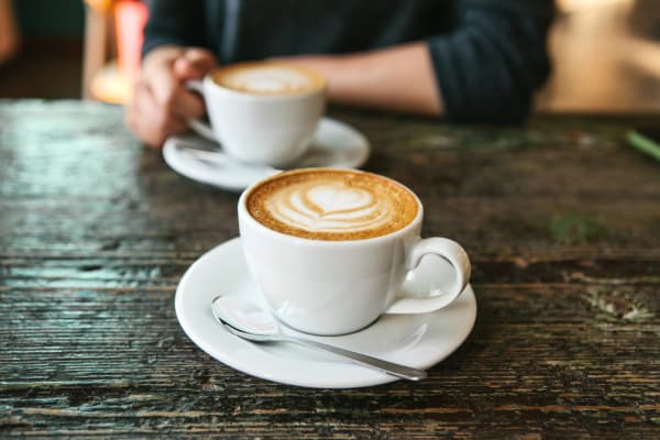 Coffees with latte art near Cosmopolitan Apartments in Pittsburgh, Pennsylvania