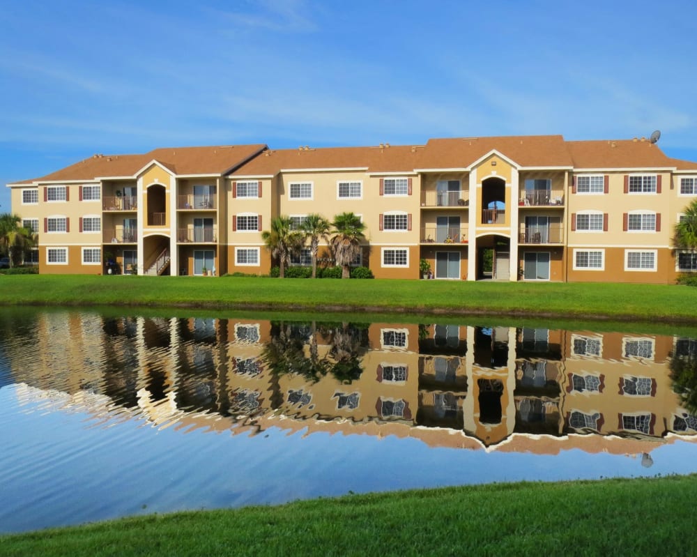 Exterior view of apartments on the water at  San Marco Apartments in Ormond Beach, Florida