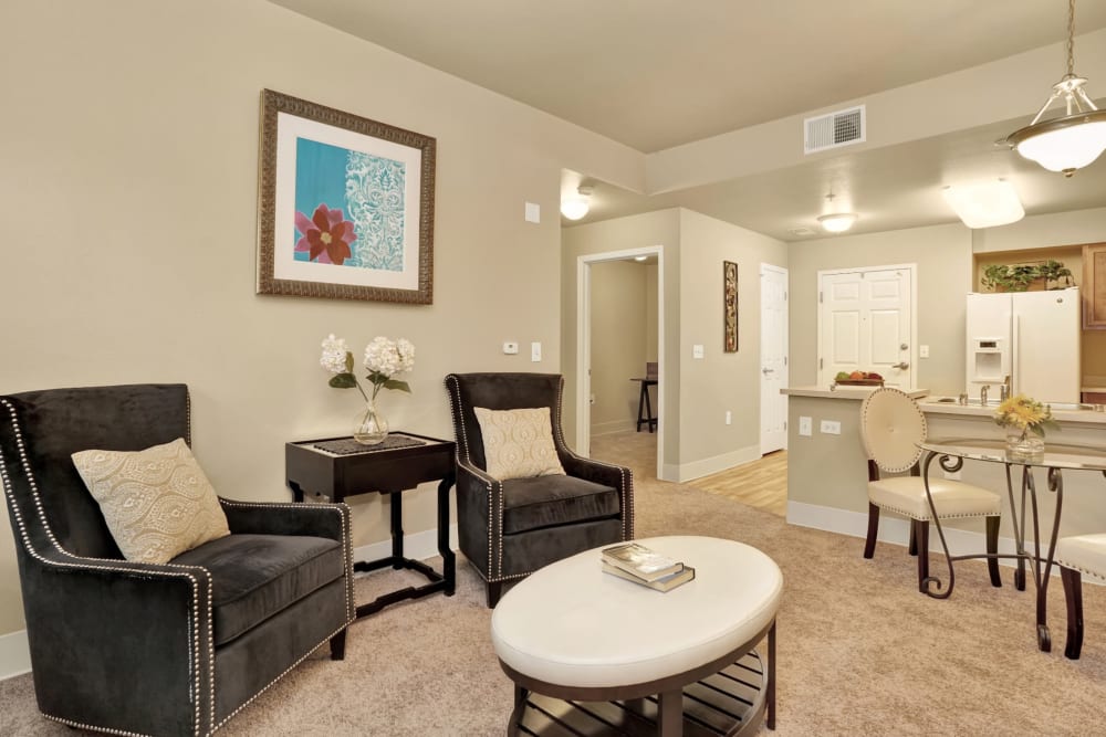 Sitting area in apartment at The Inn at Greenwood Village in Greenwood Village, Colorado