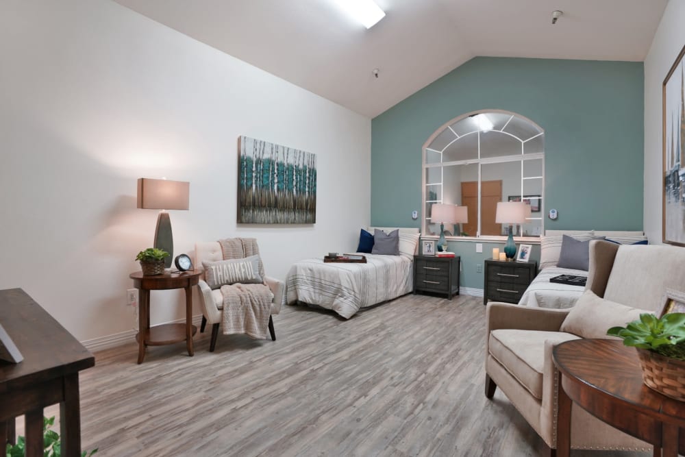 Sitting area with blue walls at MuirWoods Memory Care in Petaluma, California