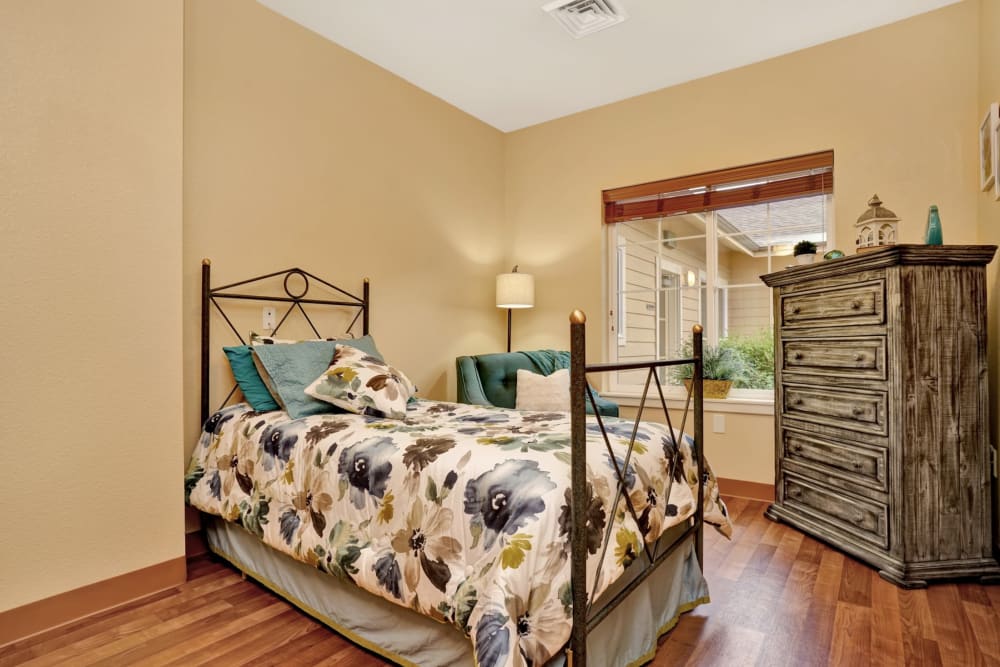 Bedroom in apartment at Seven Lakes Memory Care in Loveland, Colorado