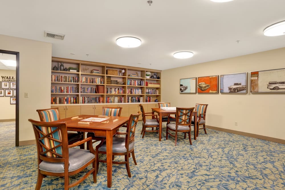 Seating at hardwood tables with bookshelves at Mountlake Terrace Plaza in Mountlake Terrace, Washington