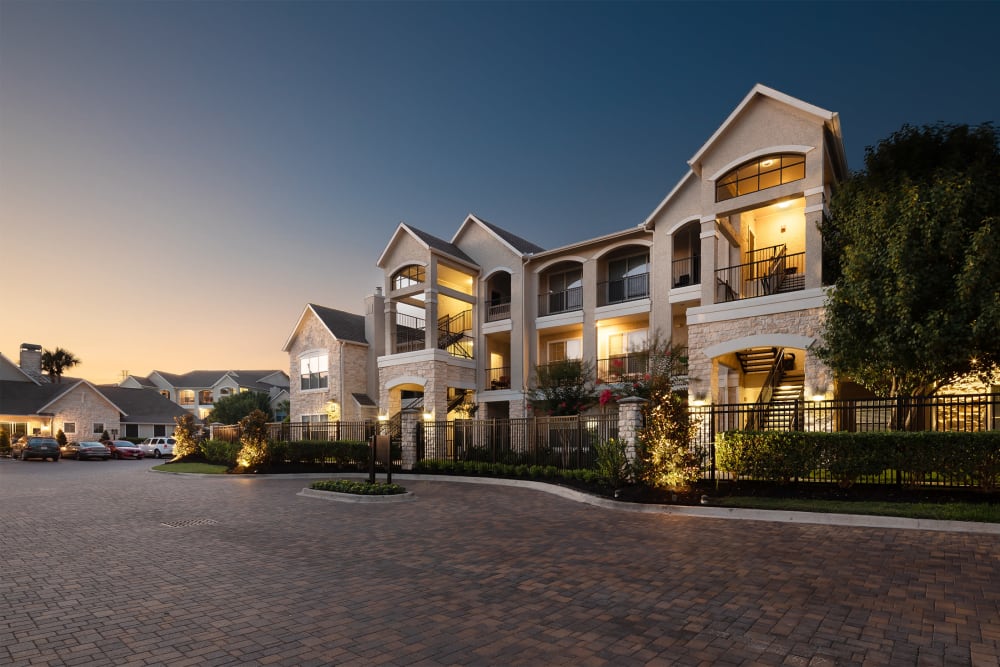 Twilight view of the exterior of a luxury multifamily community by Electra America in Lake Park, Florida