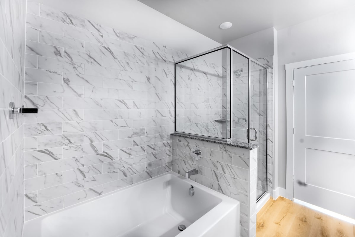 Soaking tub with walk in shower at The Gabriel in Leander, Texas