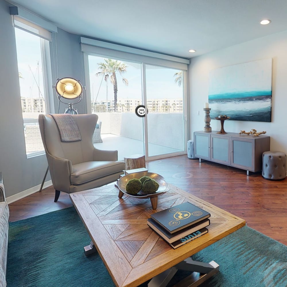 Hardwood flooring and marina views from the living area of a model home at Esprit Marina del Rey in Marina del Rey, California