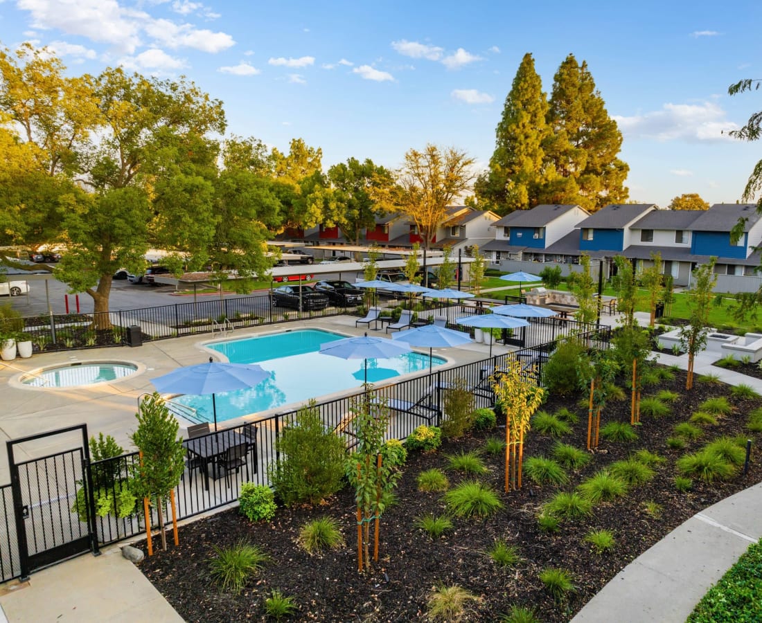 Beautifully landscaped outdoor are near pool at  The Mews At Dixon Farms in Dixon, California