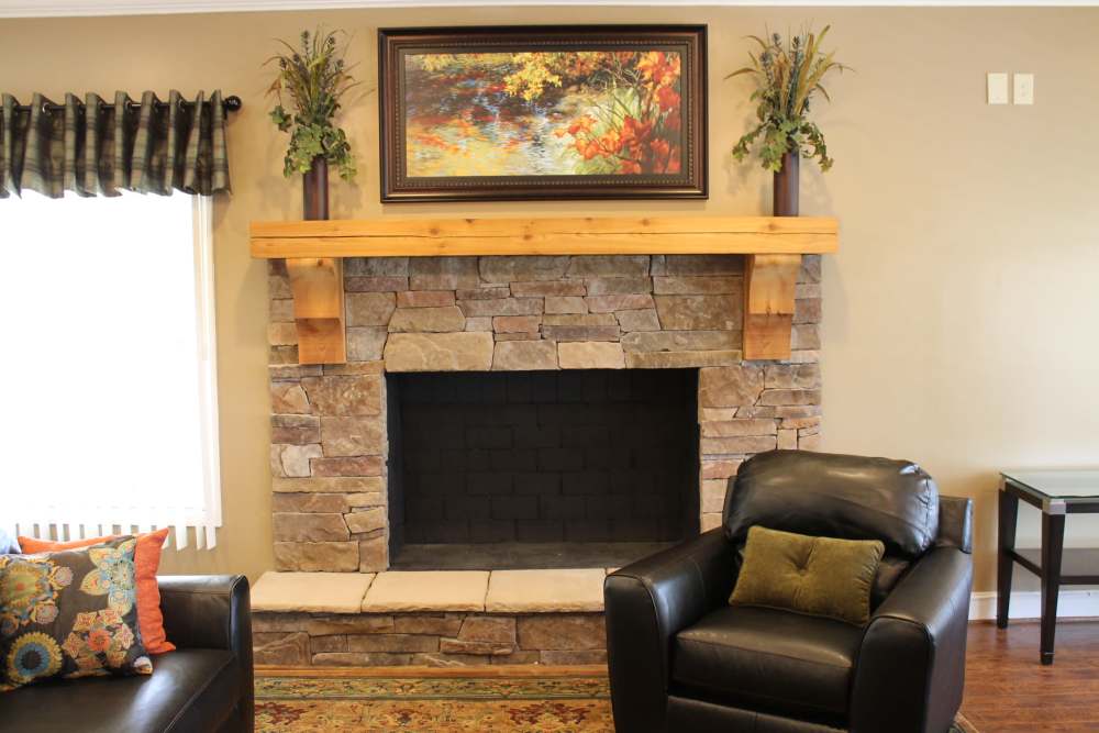 Community clubhouse with fireplace at The Abbey at Riverchase in Hoover, Alabama