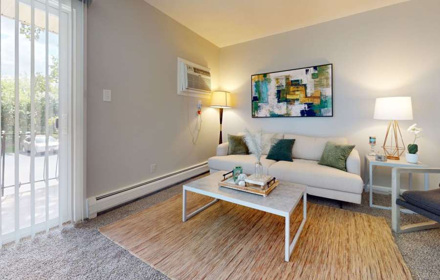 Apartment living room at Broadway Crossing Apartments in Merrillville, Indiana