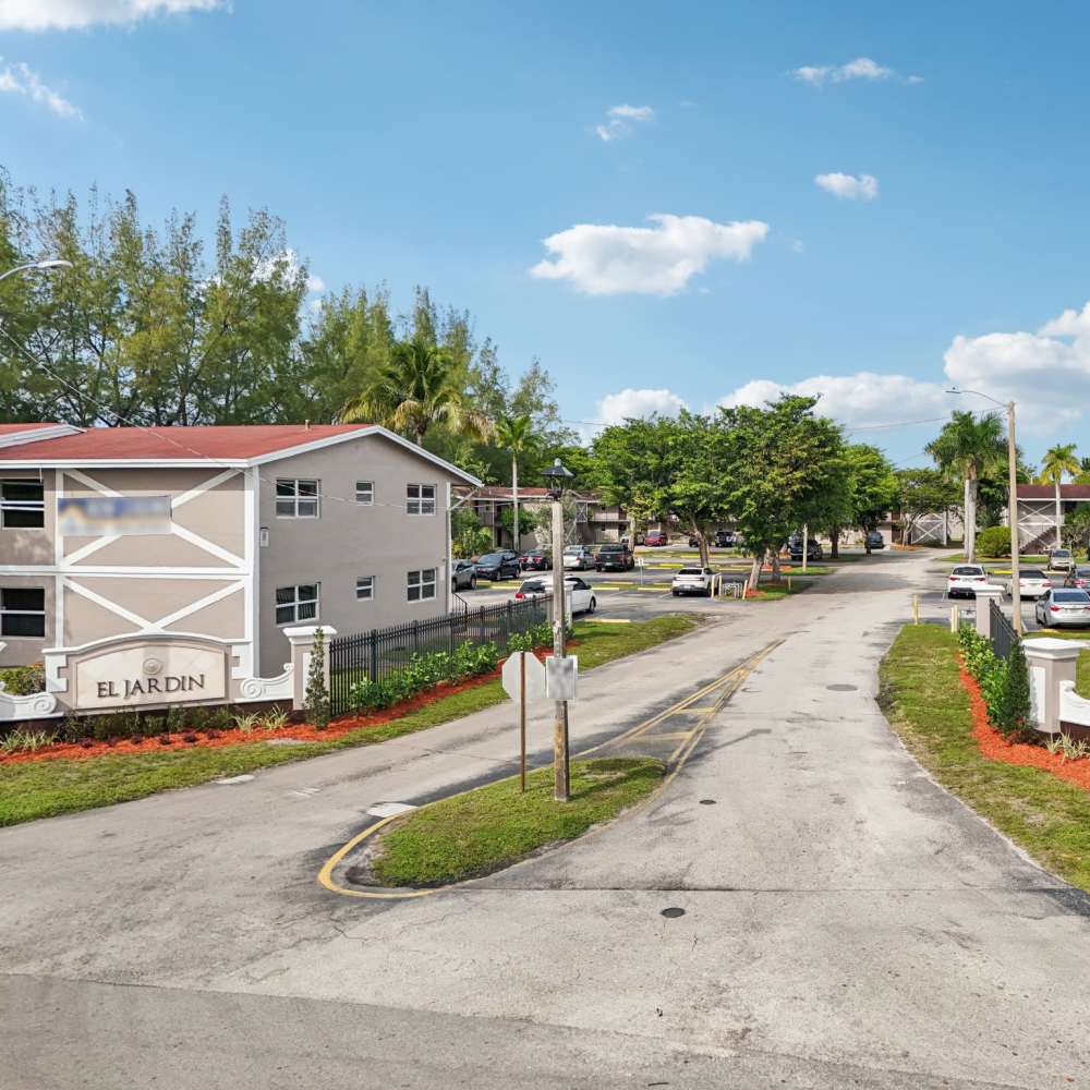 Entrance of apartments at El Jardin Apartments in Hollywood, Florida