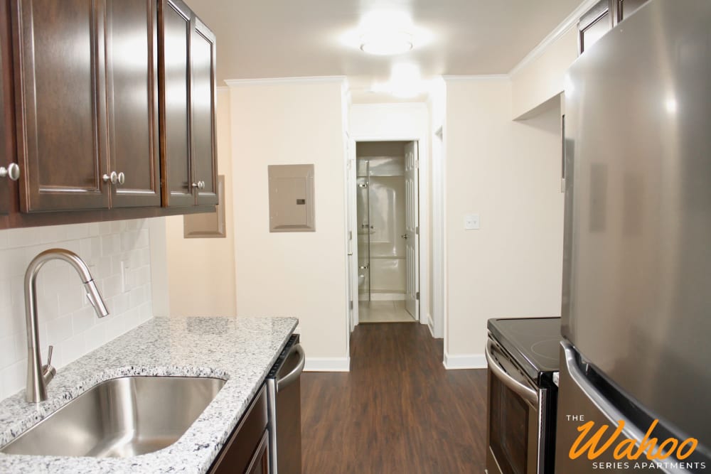 Kitchen with wood cabinetry at University Heights in Charlottesville, Virginia