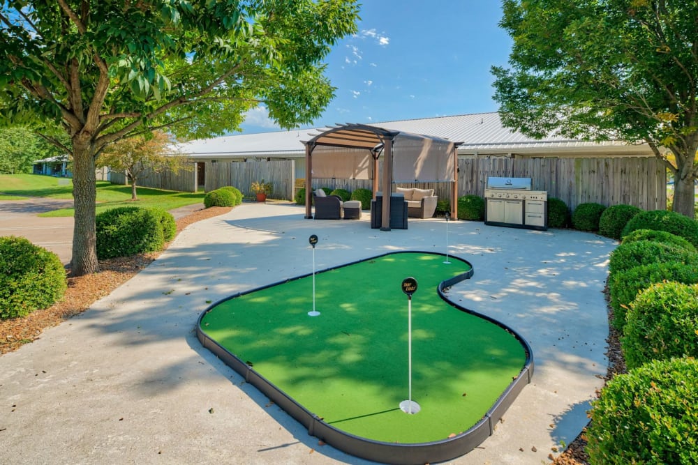 Putting green and barbecue station at Leisure Living in Evansville, Indiana