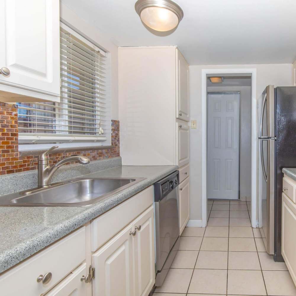 Kitchen with brick backsplash at Boulder Crescent in Colorado Springs,Colorado