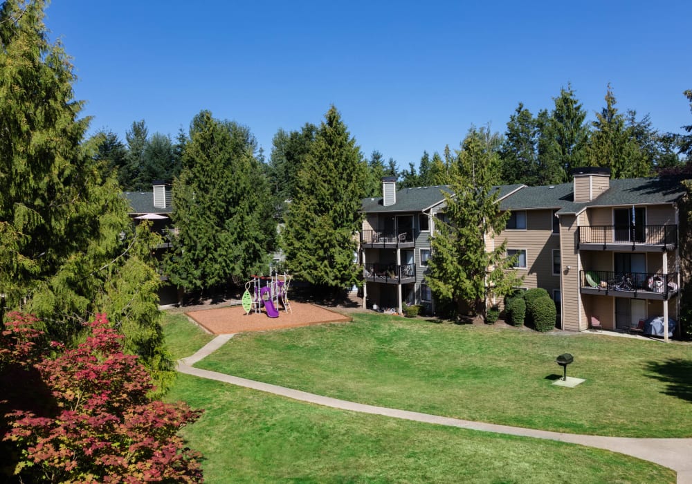 Our community's entrance sign welcoming residents and their guests to Madison Sammamish Apartments in Sammamish, Washington