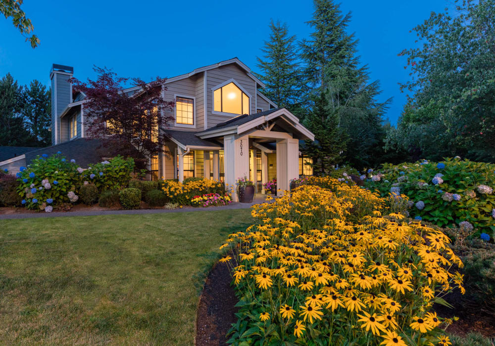 Outdoor area with a well manicured lawn at Madison Sammamish Apartments in Sammamish, Washington