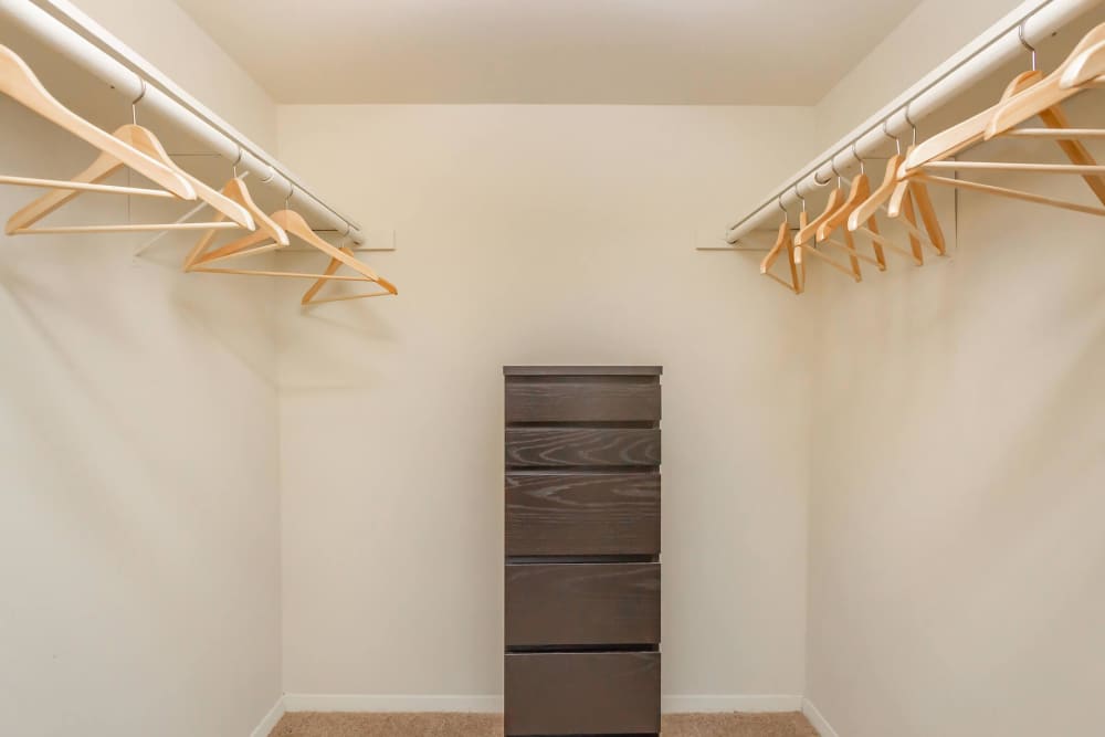 A walk-in closet of a bedroom at Village at Town Park in Hampton, Virginia